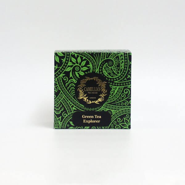 Box of loose leaf tea with a green pattern